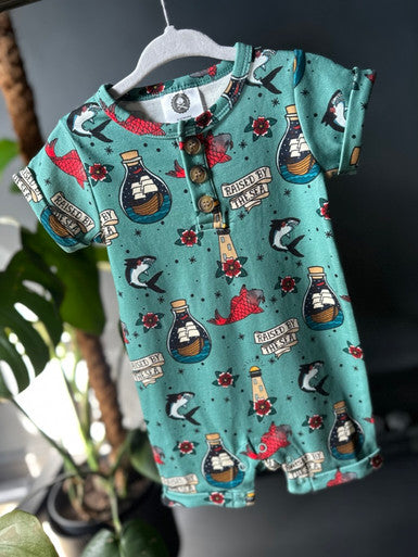 Raised by the sea bottle green romper