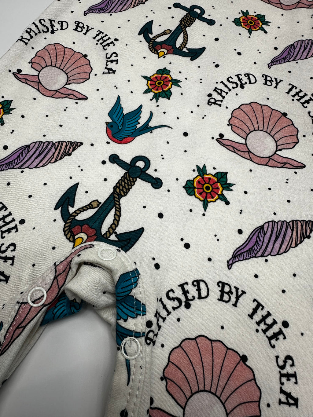 Raised by the sea pearl baby romper